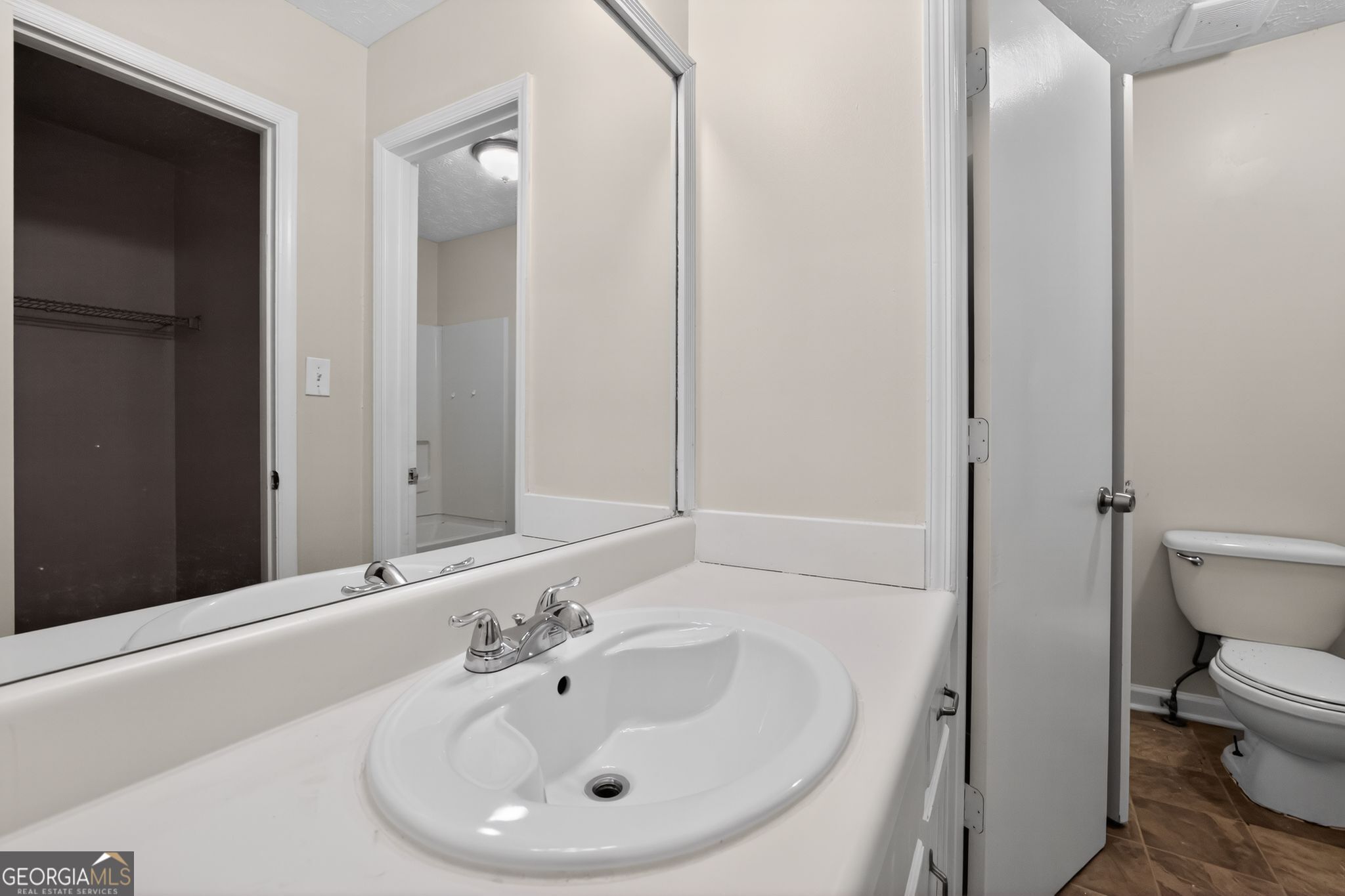 4586 High Gate Lane Lithonia, GA 30038 - Photo 26 of 33 a bathroom with a sink and a toilet