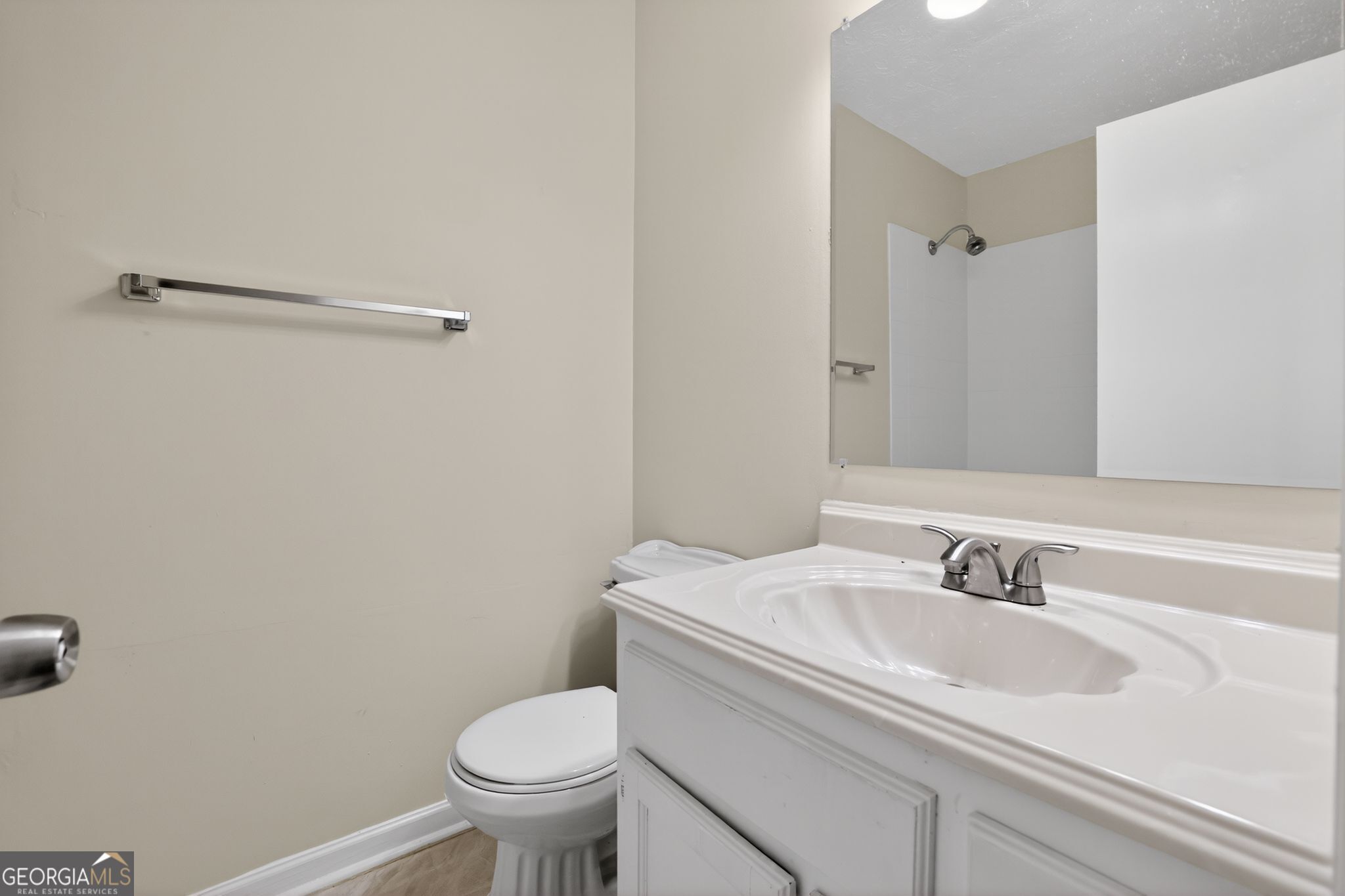 4586 High Gate Lane Lithonia, GA 30038 - Photo 27 of 33 a bathroom with a sink and a toilet