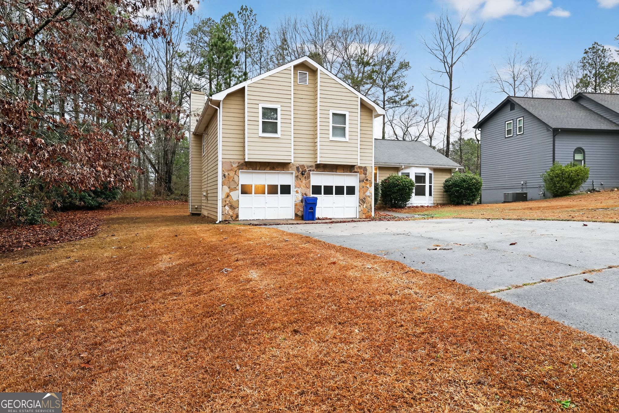 4586 High Gate Lane Lithonia, GA 30038 - Photo 3 of 33 a front view of a house with a yard