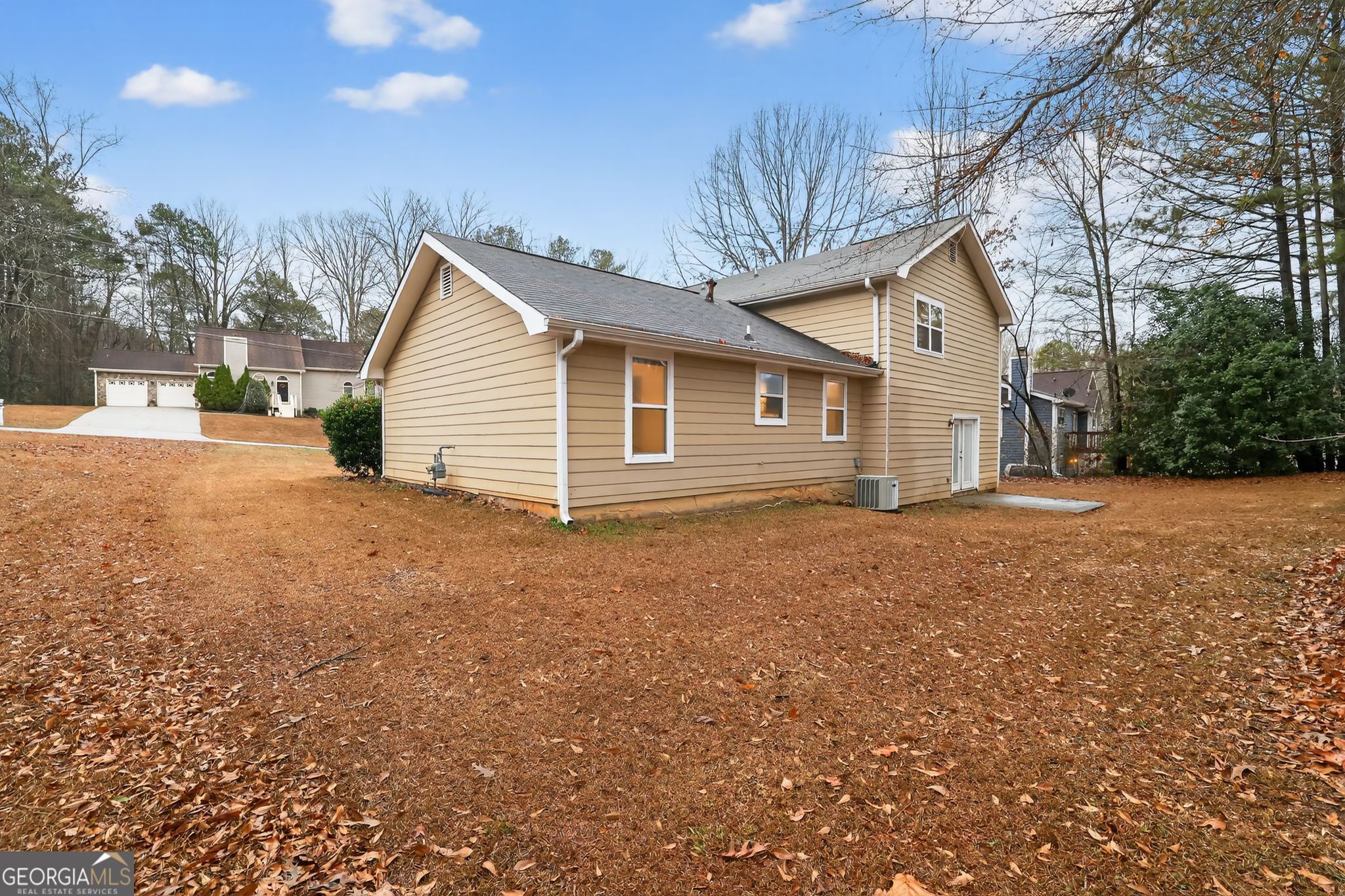 4586 High Gate Lane Lithonia, GA 30038 - Photo 31 of 33 a view of a house with a backyard