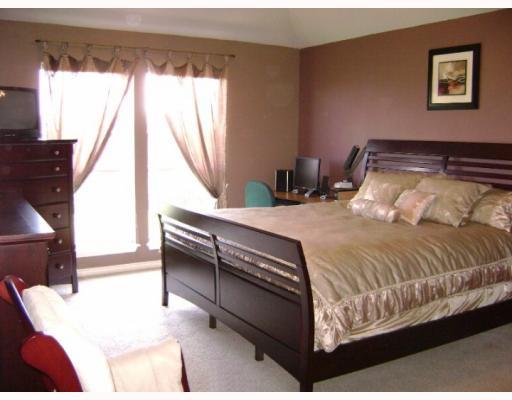 5126 Spring Brook Drive Corpus Christi, TX 78413 - Photo 5 of 10 a bedroom with a bed and a window