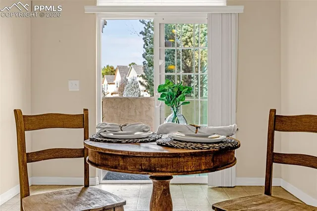 a living room with furniture and window