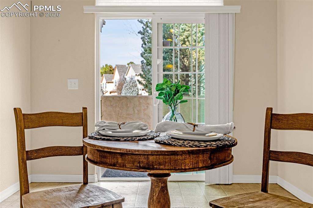 6658 Bethesda Point, Unit A Colorado Springs, CO 80918 - Photo 13 of 44 a living room with furniture and window