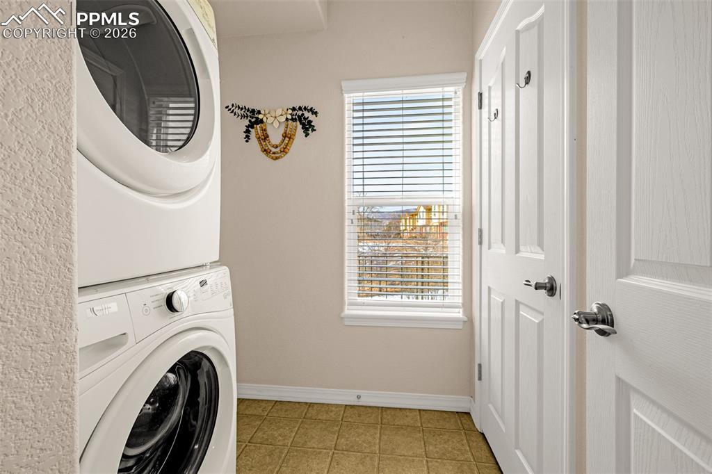 6658 Bethesda Point, Unit A Colorado Springs, CO 80918 - Photo 17 of 44 a view of bathroom with washing machine
