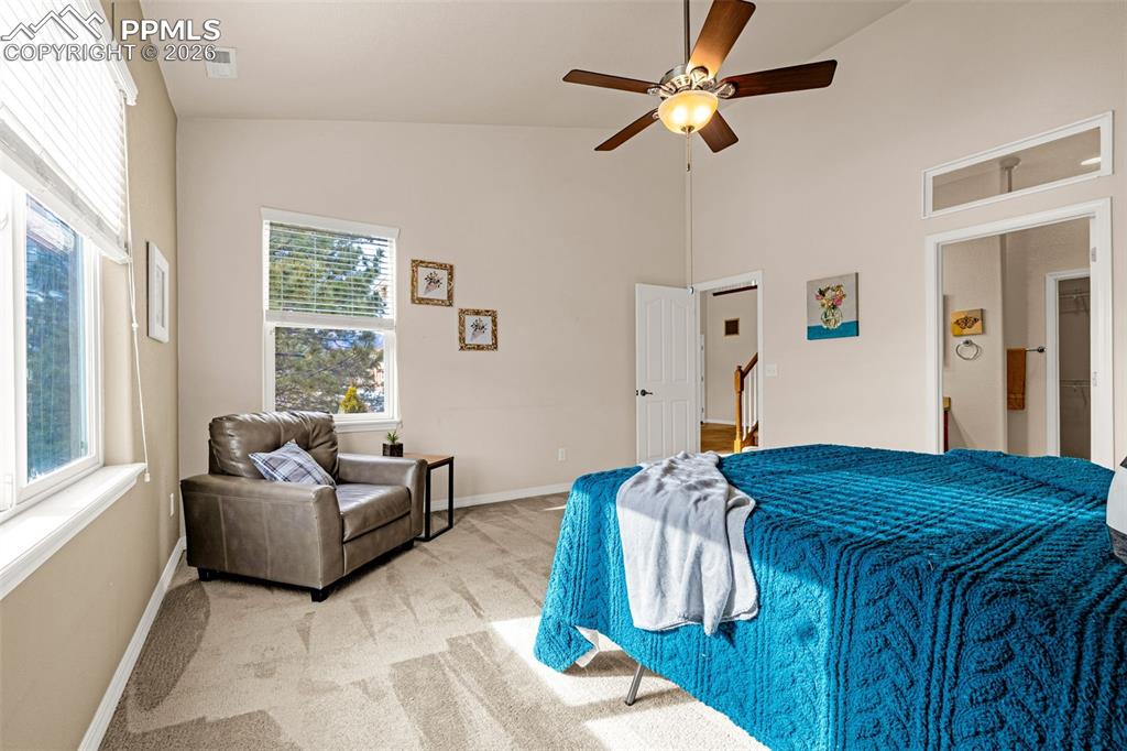 6658 Bethesda Point, Unit A Colorado Springs, CO 80918 - Photo 20 of 44 a living room with furniture and a large window