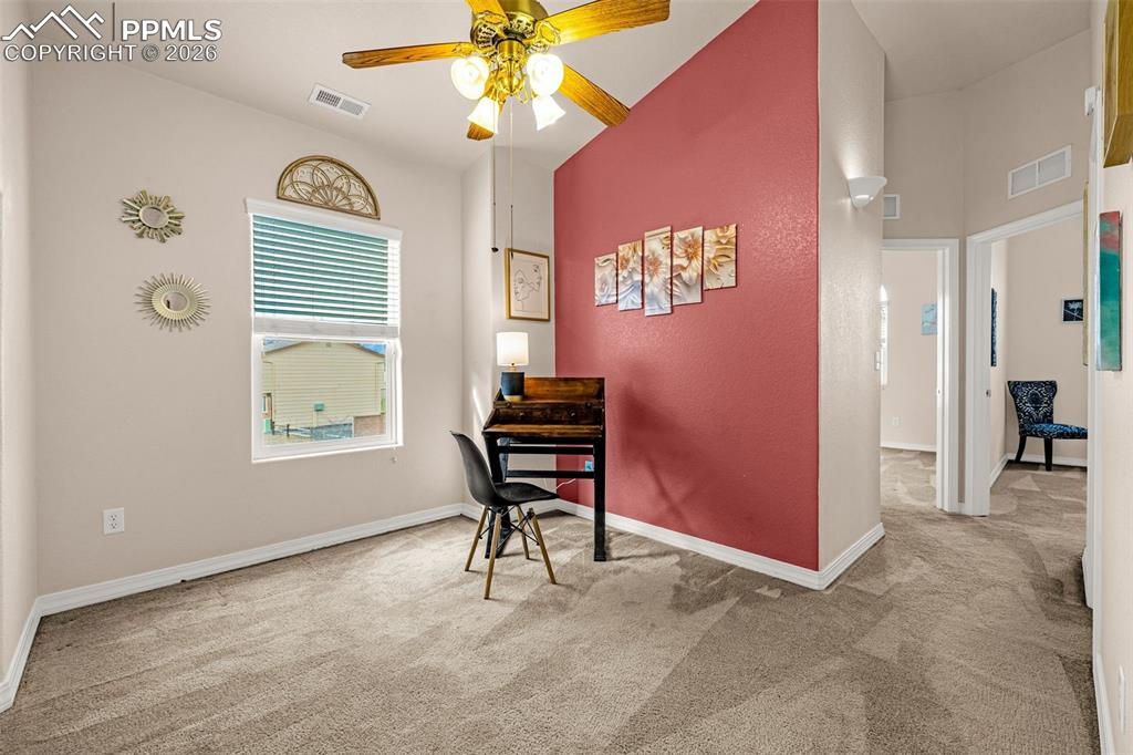 6658 Bethesda Point, Unit A Colorado Springs, CO 80918 - Photo 24 of 44 a view of an empty room with a window