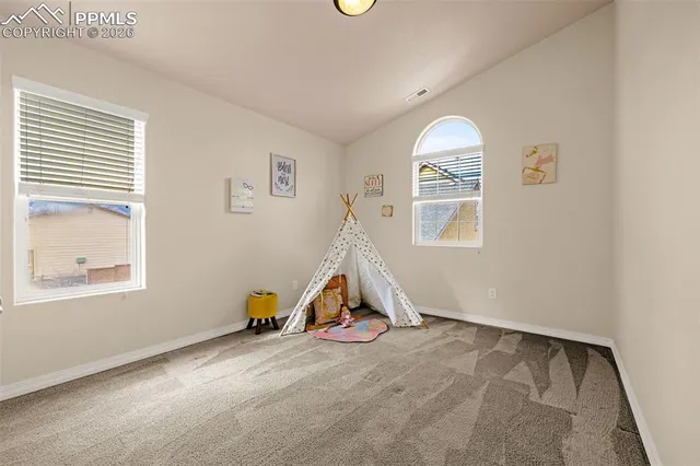 an empty room with windows