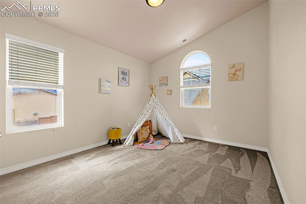 6658 Bethesda Point, Unit A Colorado Springs, CO 80918 - Photo 27 of 44 an empty room with windows