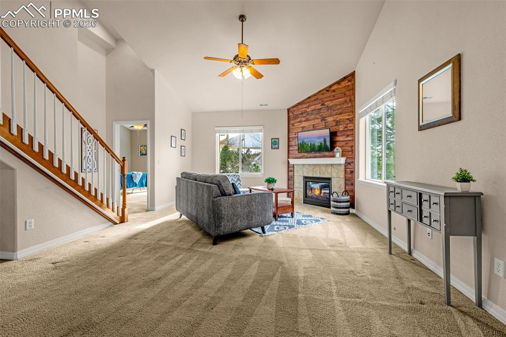 6658 Bethesda Point, Unit A Colorado Springs, CO 80918 - Photo 4 of 44 a living room with furniture and a fireplace