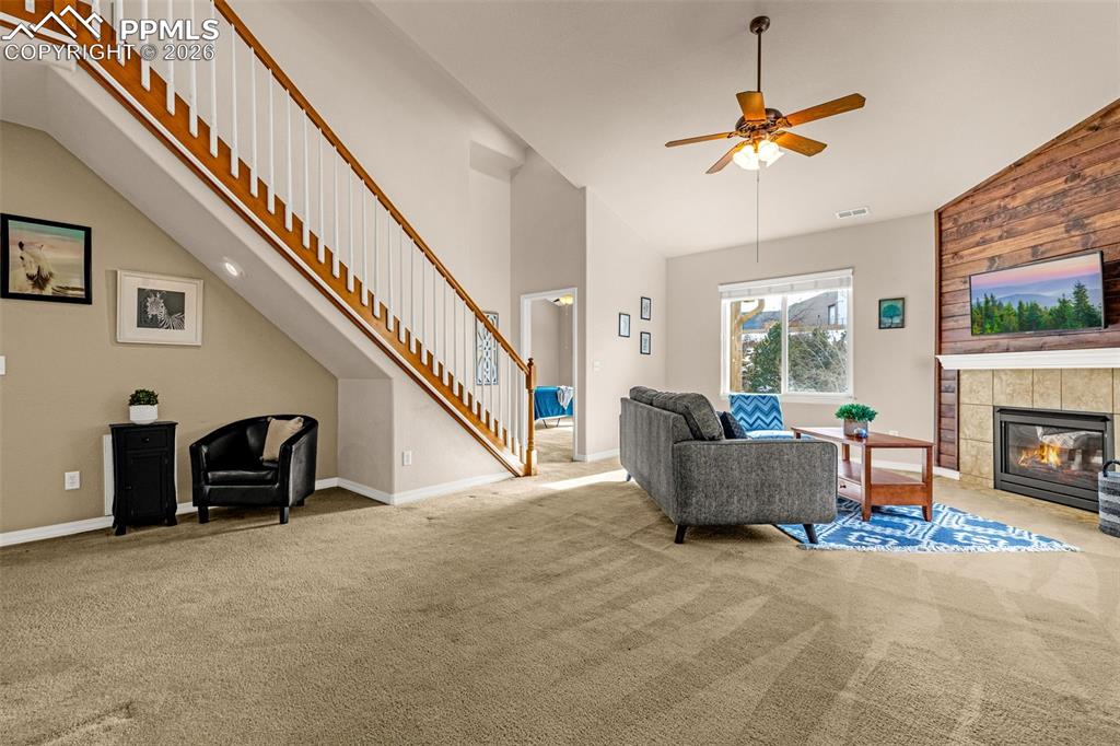 6658 Bethesda Point, Unit A Colorado Springs, CO 80918 - Photo 5 of 44 a living room with furniture and a fireplace