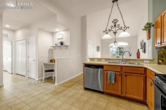 a view of a kitchen from a dining room