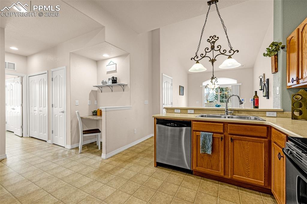 6658 Bethesda Point, Unit A Colorado Springs, CO 80918 - Photo 10 of 44 a view of a kitchen from a dining room