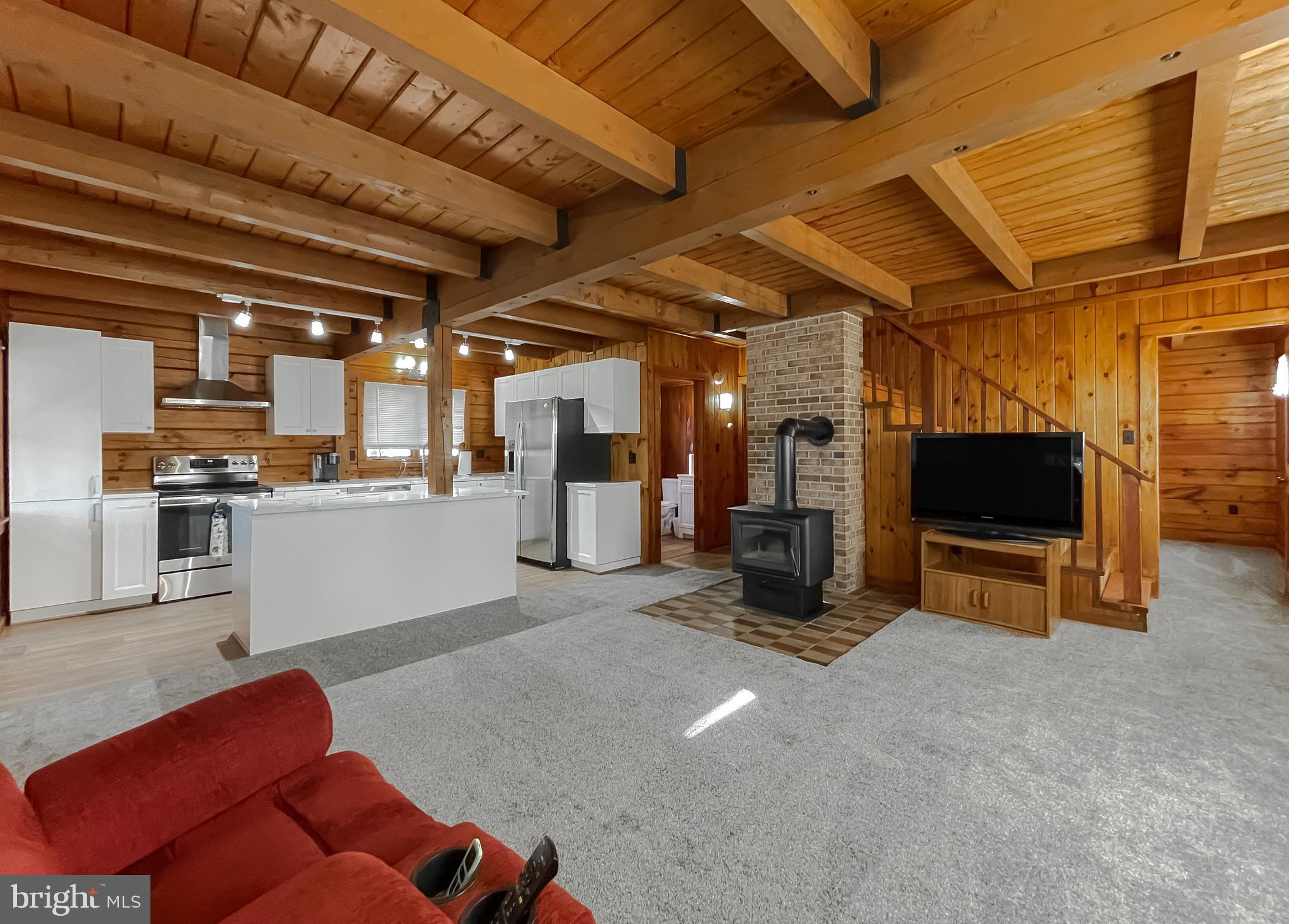 23581 Belmar Drive Leonardtown, MD 20650 - Photo 13 of 54 a living room with furniture and a flat screen tv