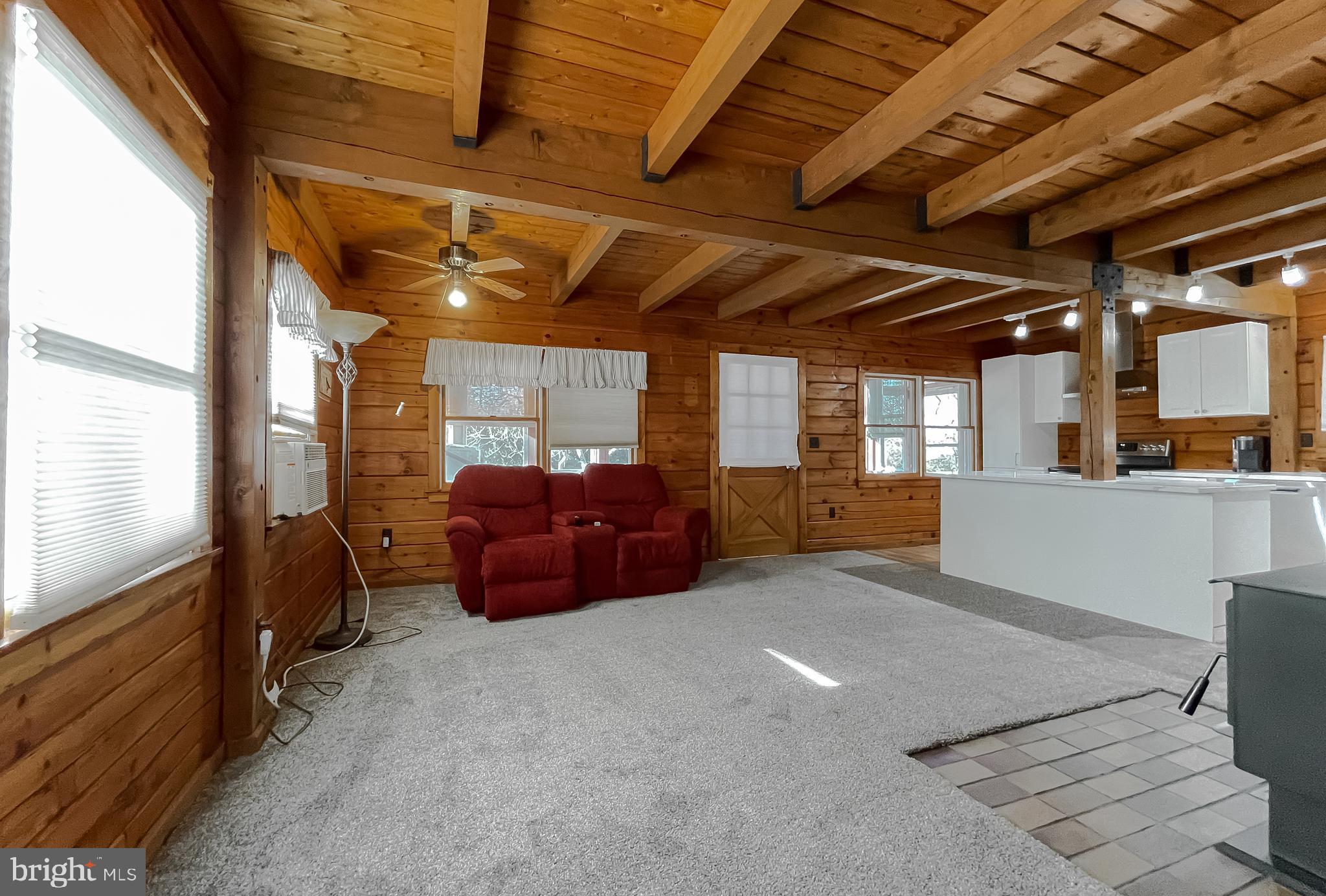 23581 Belmar Drive Leonardtown, MD 20650 - Photo 17 of 54 a large room with wooden furniture