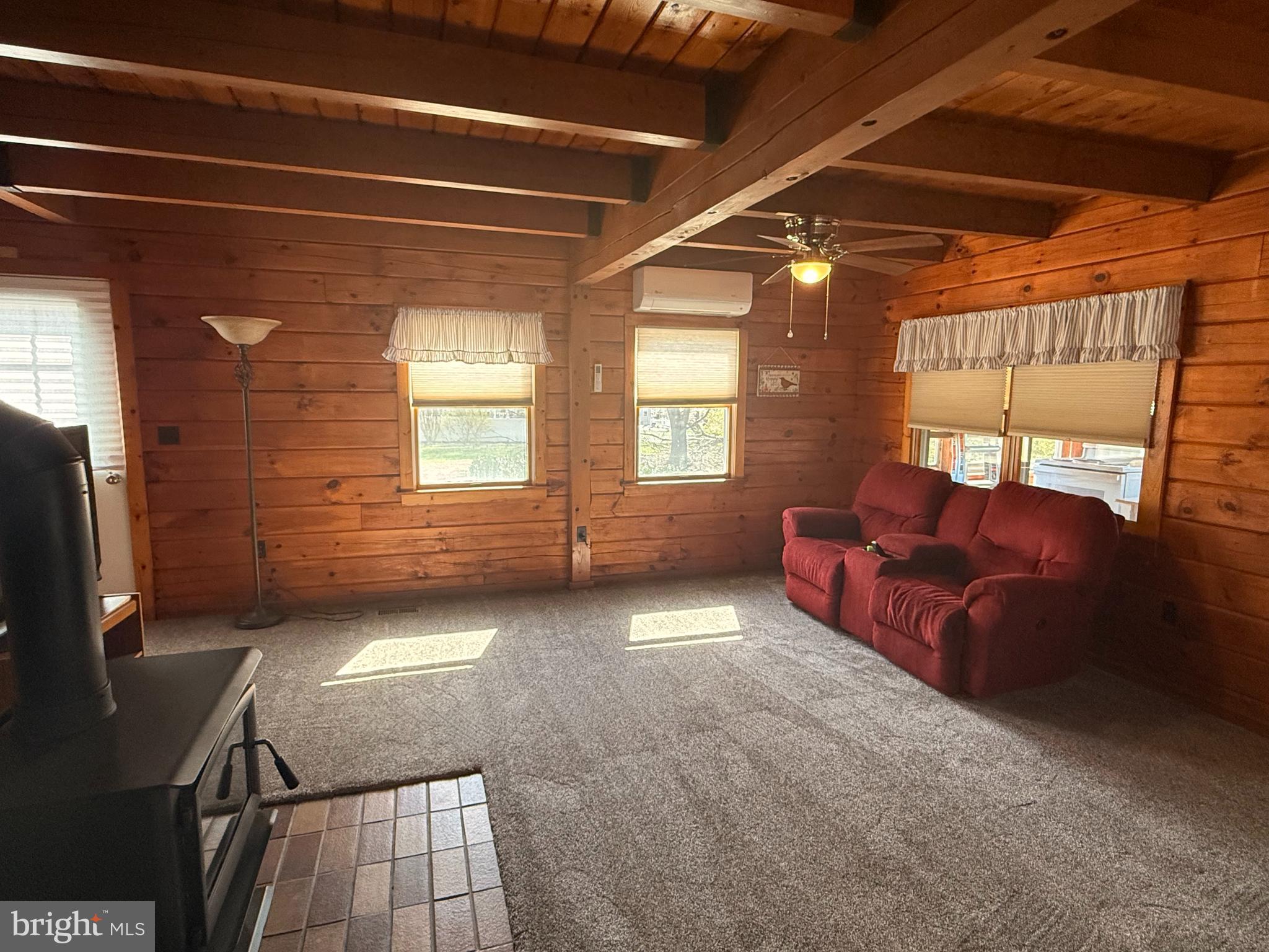 23581 Belmar Drive Leonardtown, MD 20650 - Photo 22 of 54 a living room with furniture and a flat screen tv