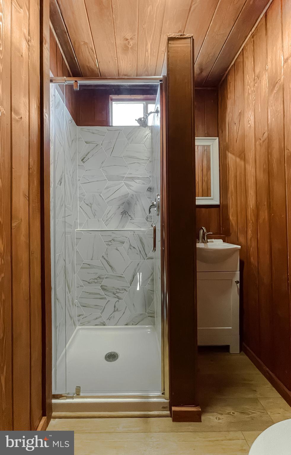 23581 Belmar Drive Leonardtown, MD 20650 - Photo 29 of 54 a bathroom with a bathtub and shower