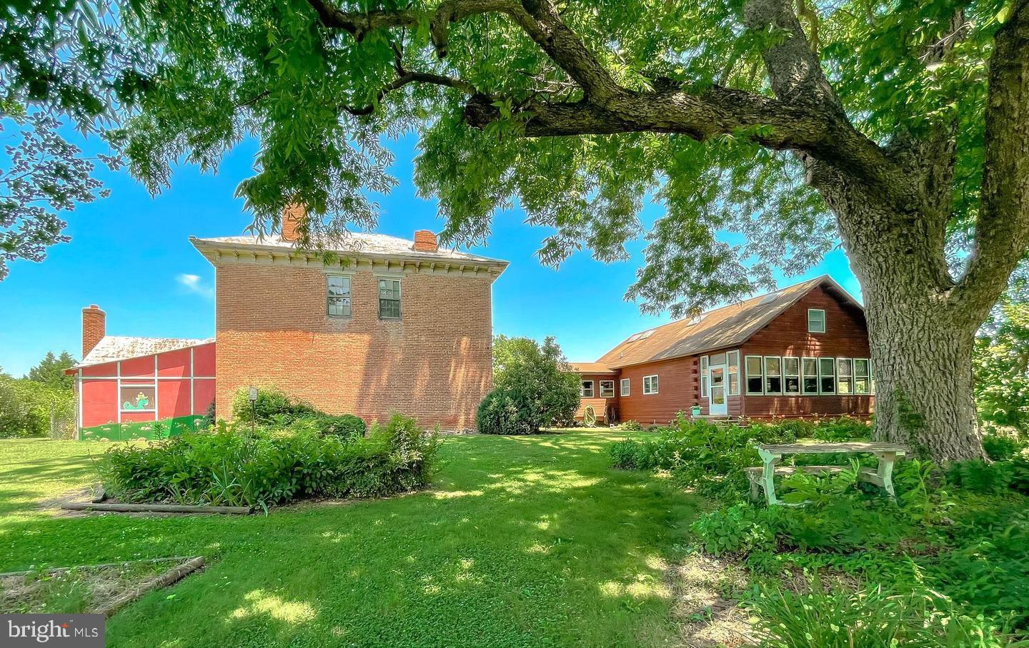 23581 Belmar Drive Leonardtown, MD 20650 - Photo 52 of 54 a front view of a house with garden