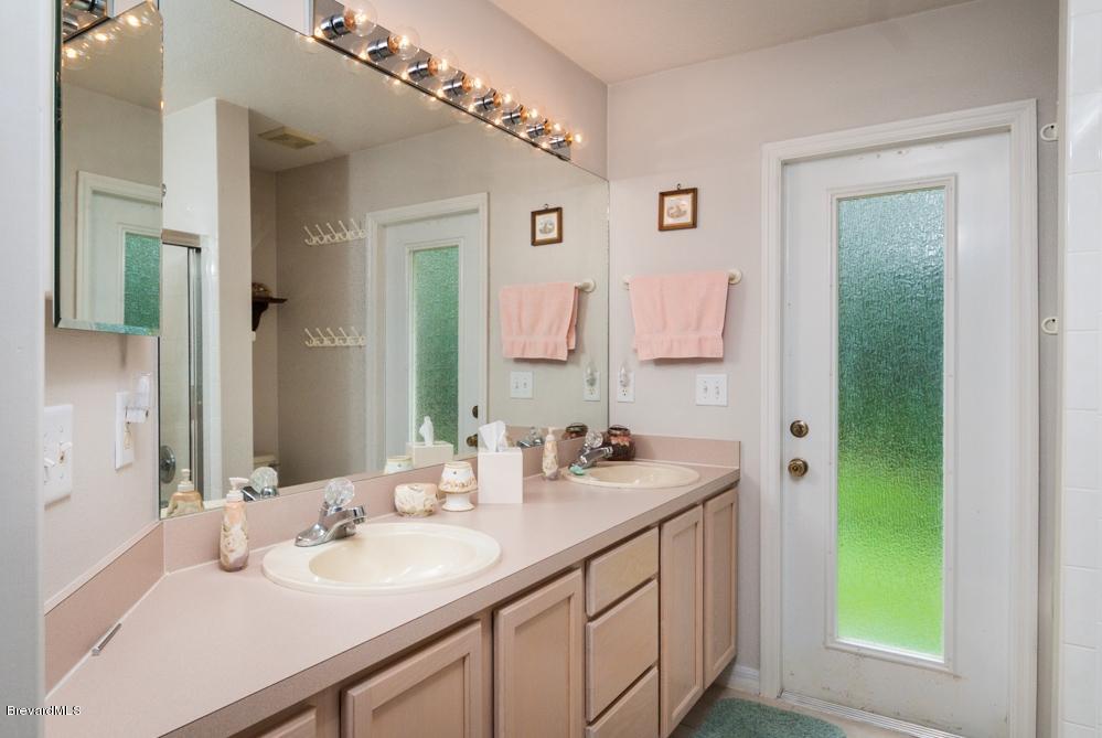 4313 Long Lake Road Melbourne, FL 32934 - Photo 6 of 26 GUEST BATH