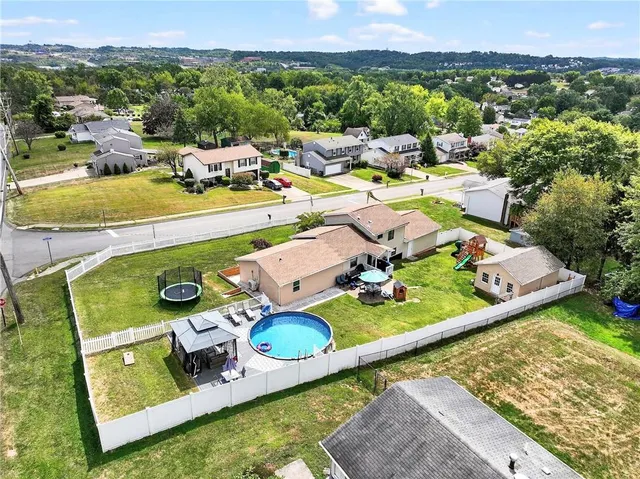 aerial view of a house with outdoor space