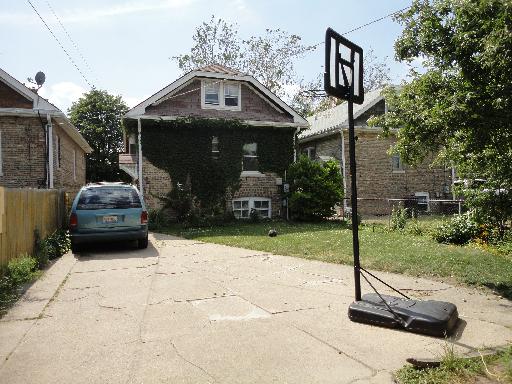 2529 Grove Avenue Berwyn, IL 60402 - Photo 15 of 16 a front view of a house with a yard