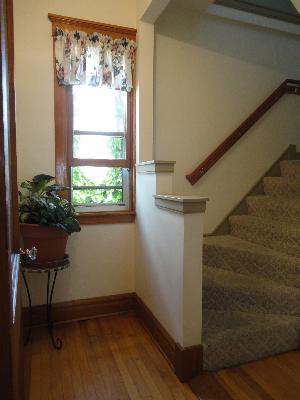 2529 Grove Avenue Berwyn, IL 60402 - Photo 8 of 16 a view of empty room with wooden floor and window
