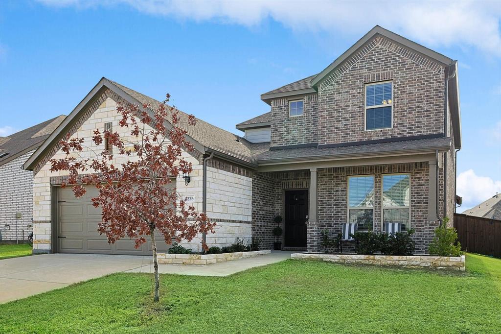 4235 Bullock Lane Forney, TX 75126 - Photo 1 of 40 a front view of a house with a yard