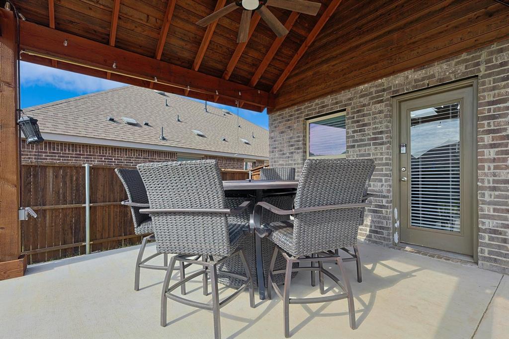 4235 Bullock Lane Forney, TX 75126 - Photo 32 of 40 a view of a chairs and table in the patio