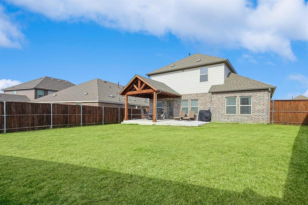 4235 Bullock Lane Forney, TX 75126 - Photo 34 of 40 a view of a yard in front of house