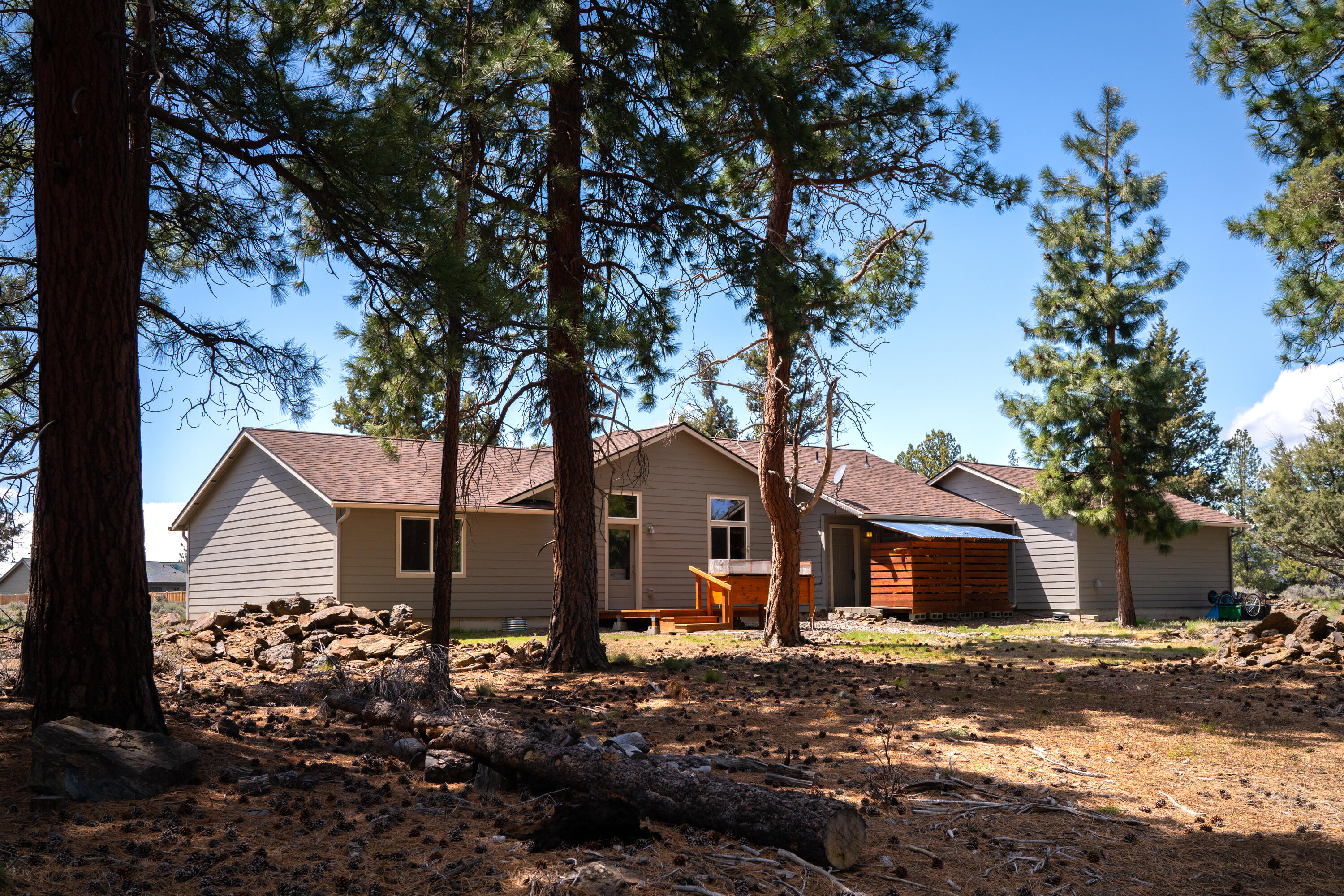 70099 Indian Ford Road Sisters, OR 97759 - Photo 7 of 27 a front view of a house with a tree