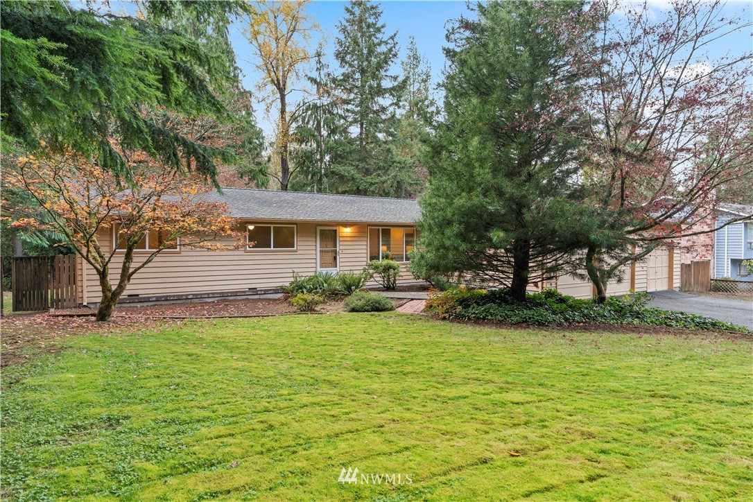 19728 45th Avenue Southeast Bothell, WA 98012 - Photo 1 of 25 a view of a house with a yard