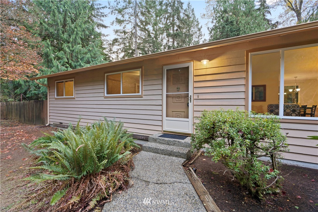 19728 45th Avenue Southeast Bothell, WA 98012 - Photo 3 of 25 a view of a house with a yard