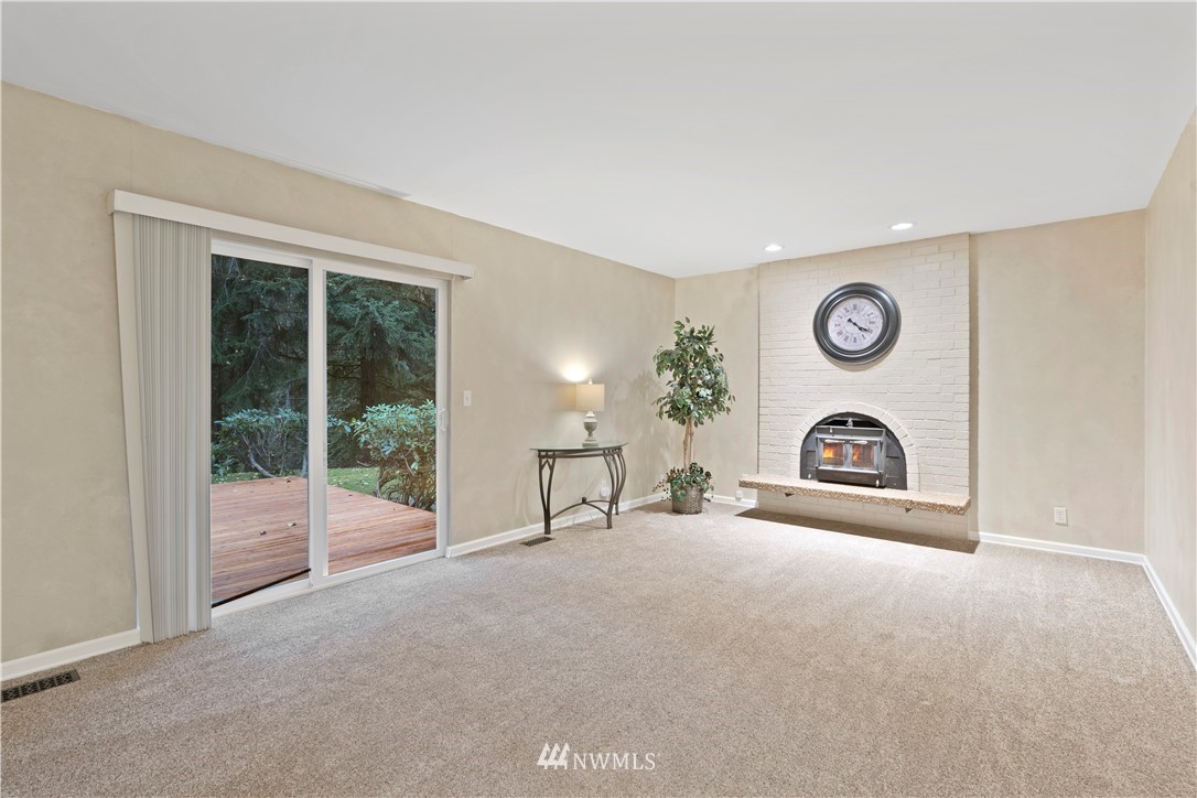 19728 45th Avenue Southeast Bothell, WA 98012 - Photo 7 of 25 a view of a livingroom with washer and dryer