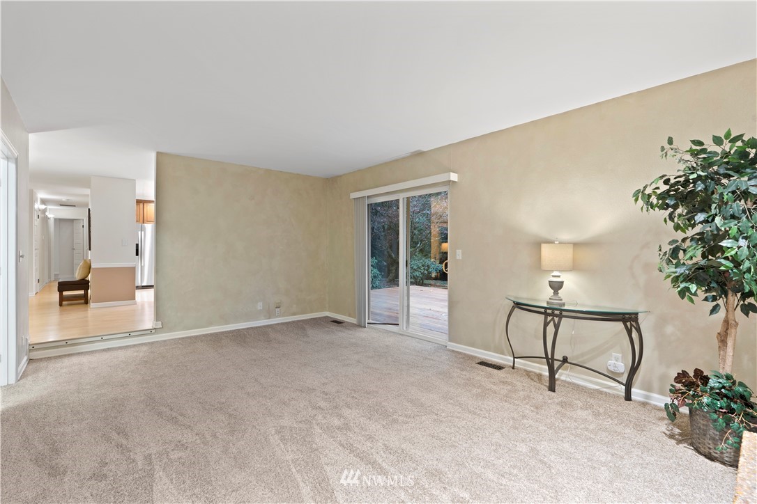 19728 45th Avenue Southeast Bothell, WA 98012 - Photo 8 of 25 a view of an empty room with a window