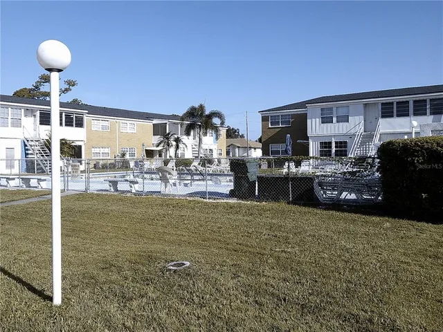 a lobby with furniture and a large window