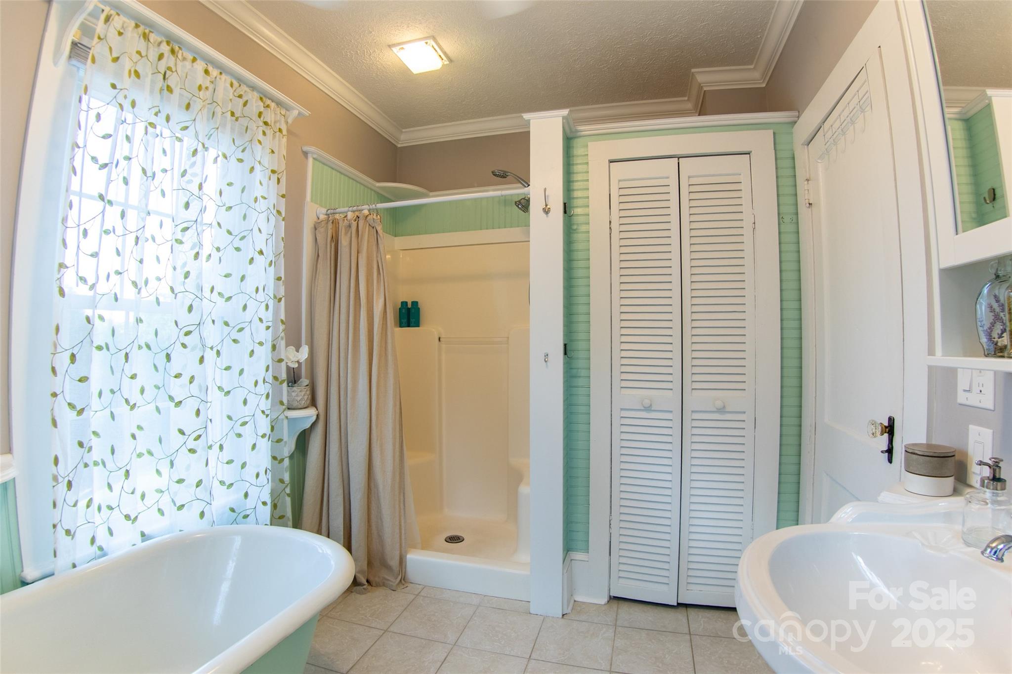 102 Cuthberson Street Morganton, NC 28655 - Photo 15 of 45 a bathroom with a bathtub and shower