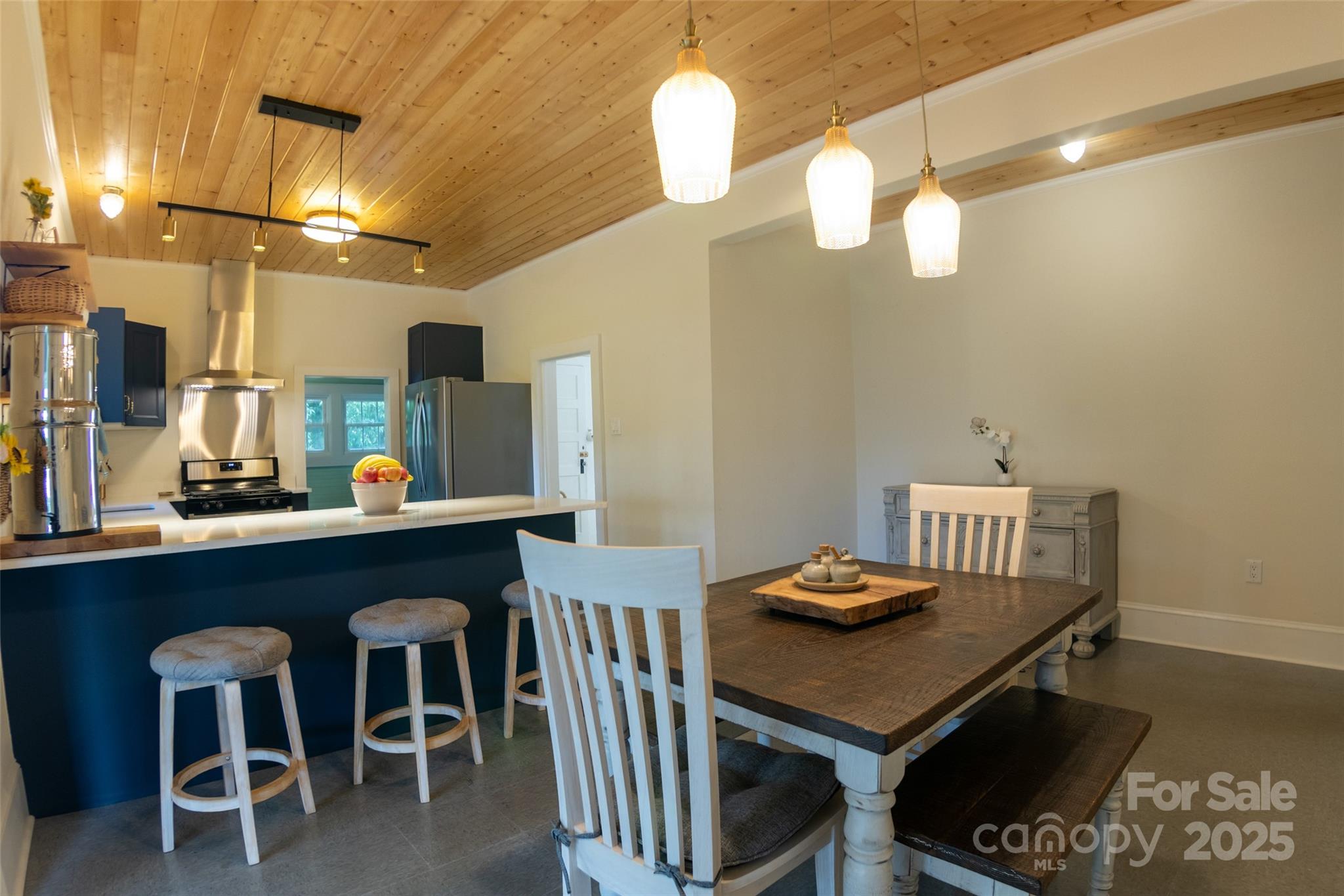 102 Cuthberson Street Morganton, NC 28655 - Photo 19 of 45 a view of a dining room with furniture and chandelier