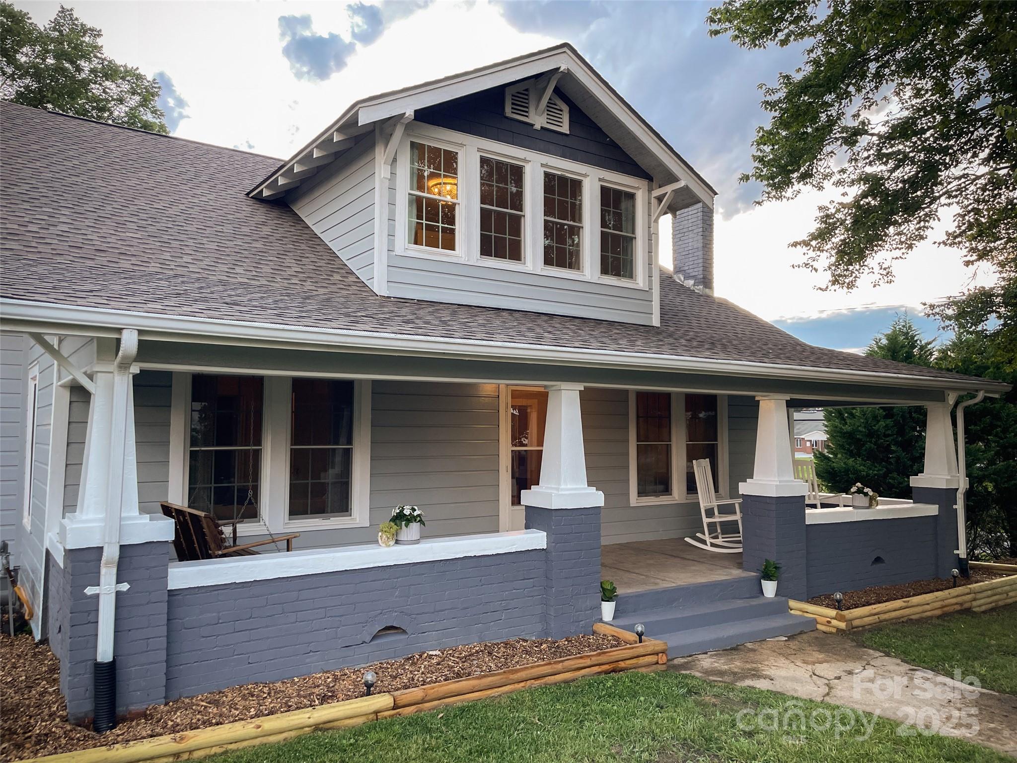 102 Cuthberson Street Morganton, NC 28655 - Photo 2 of 45 a front view of house with yard and outdoor seating