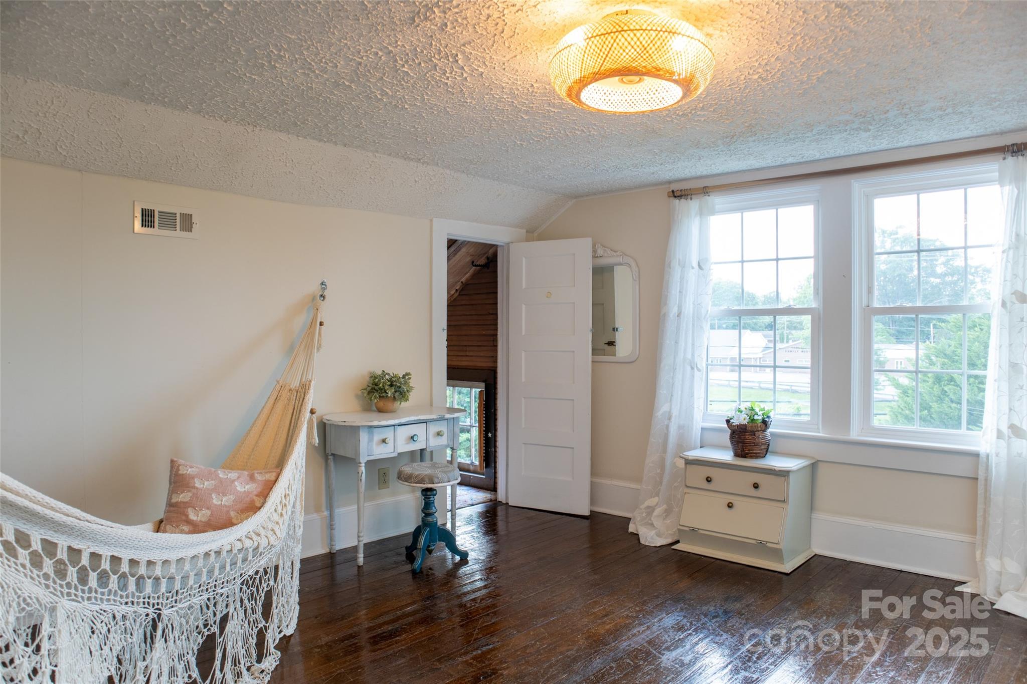 102 Cuthberson Street Morganton, NC 28655 - Photo 26 of 45 a living room with furniture and a window