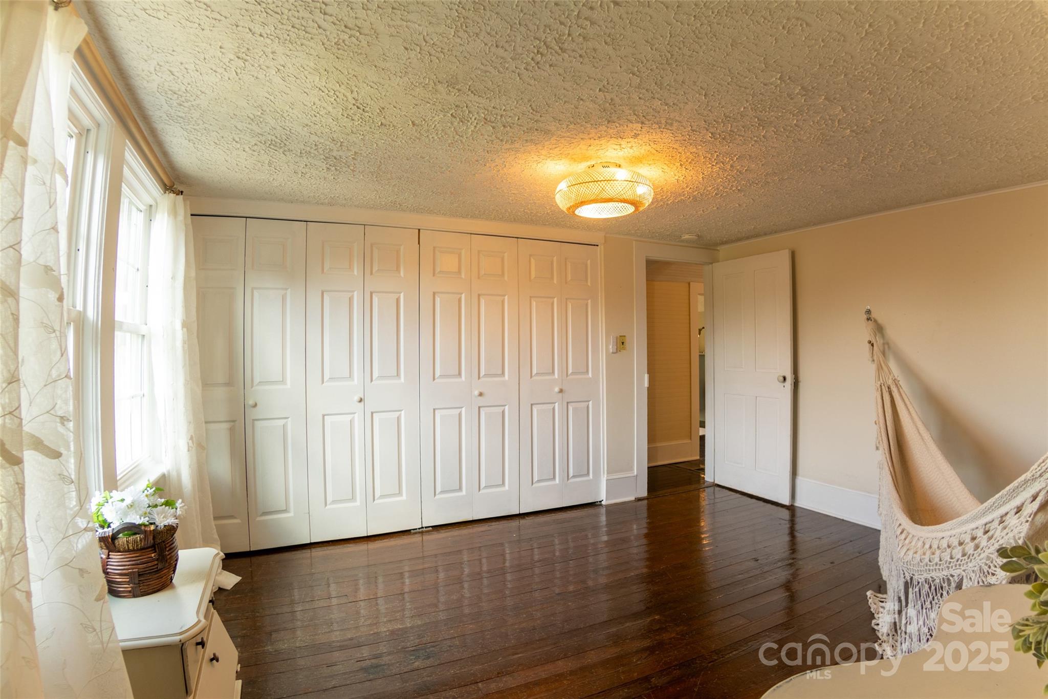 102 Cuthberson Street Morganton, NC 28655 - Photo 27 of 45 a view of entryway with wooden floor