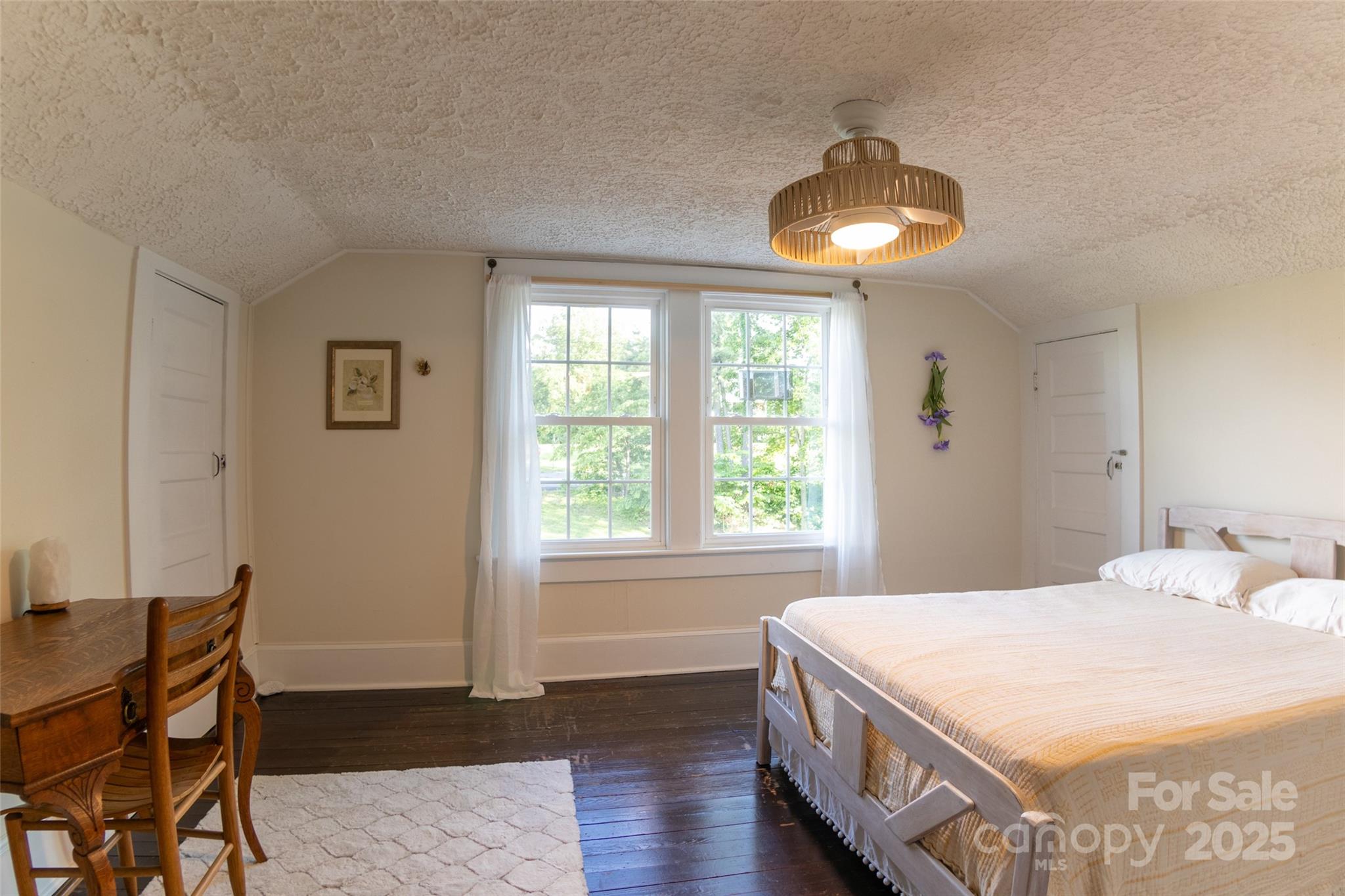 102 Cuthberson Street Morganton, NC 28655 - Photo 28 of 45 a spacious bedroom with a bed and a window