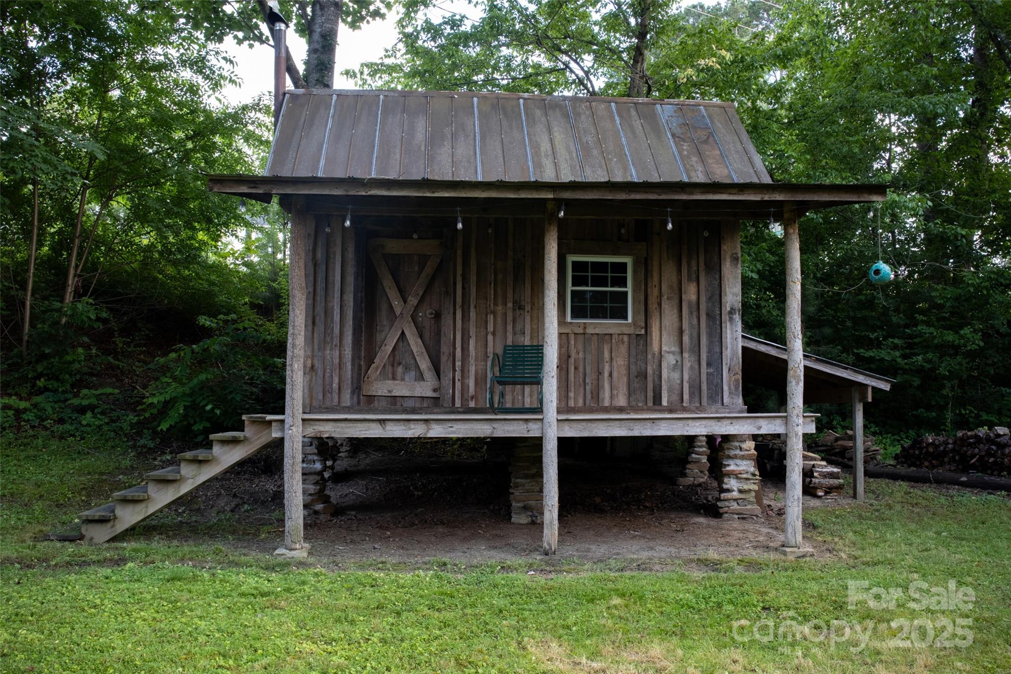 102 Cuthberson Street Morganton, NC 28655 - Photo 42 of 45 a view of wooden house with a small yard and wooden fence