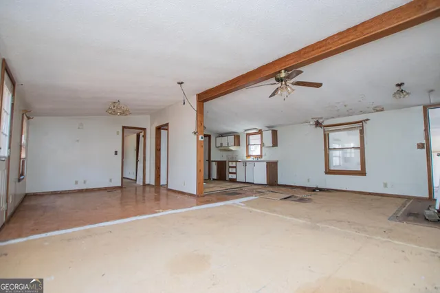 an empty room with windows