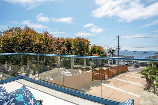 a view of a balcony with lake view