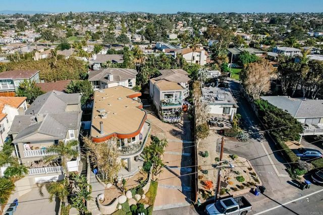 an aerial view of beach and ocean