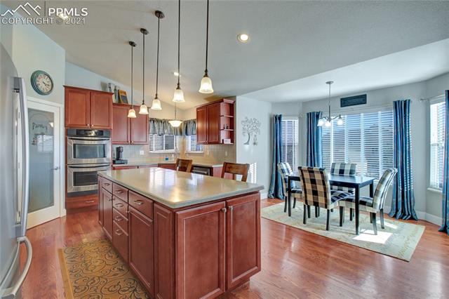 9947 Rockingham Drive Peyton, CO 80831 - Photo 10 of 43 Kitchen plus dining nook
