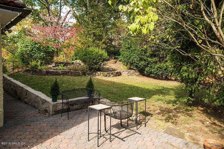 45 Sinawoy Road Cos Cob, CT 06807 - Photo 16 of 18 a view of a chairs and table in the patio