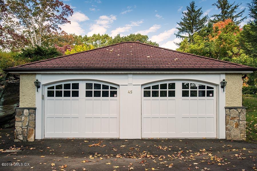 45 Sinawoy Road Cos Cob, CT 06807 - Photo 17 of 18 a front view of a house with a yard