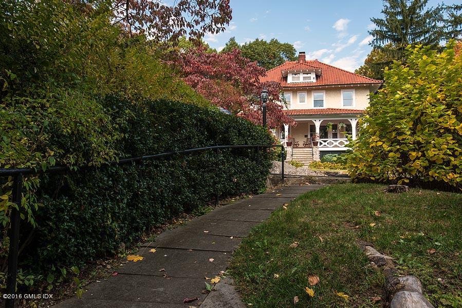 45 Sinawoy Road Cos Cob, CT 06807 - Photo 18 of 18 a front view of a house with a yard