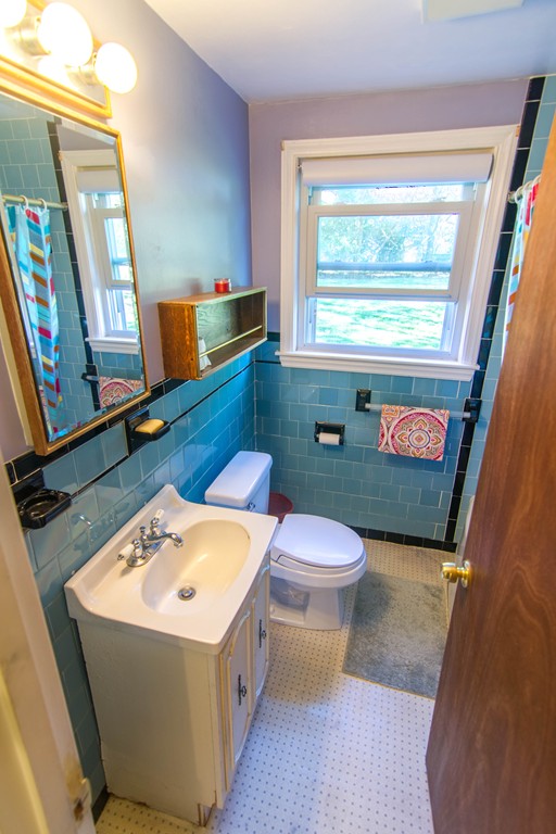 13 Wethersfield Road Natick, MA 01760 - Photo 6 of 11 a bathroom with a sink toilet and mirror