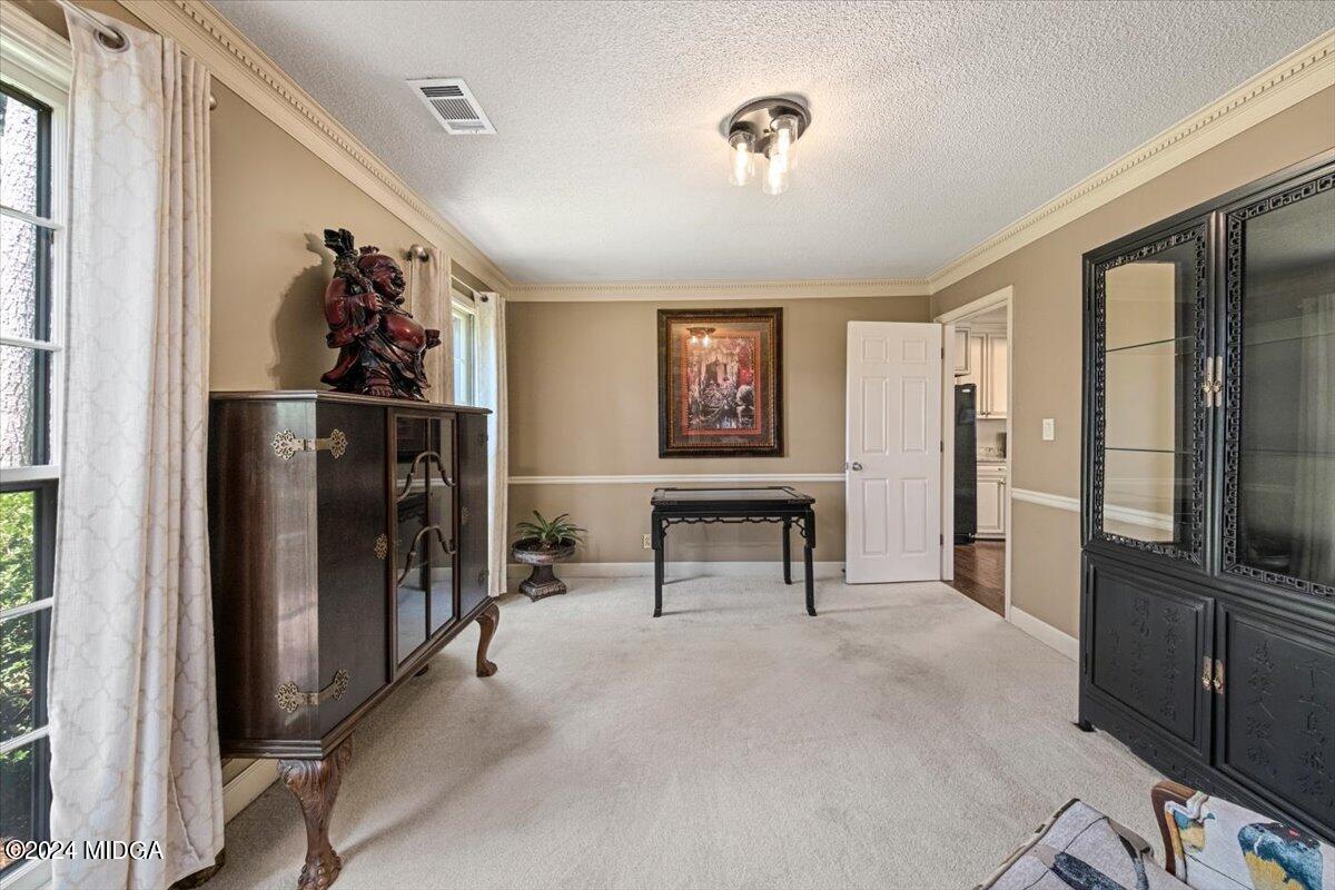5369 Rivoli Drive Macon, GA 31210 - Photo 15 of 40 a view of a hallway with workspace to rooms and living room